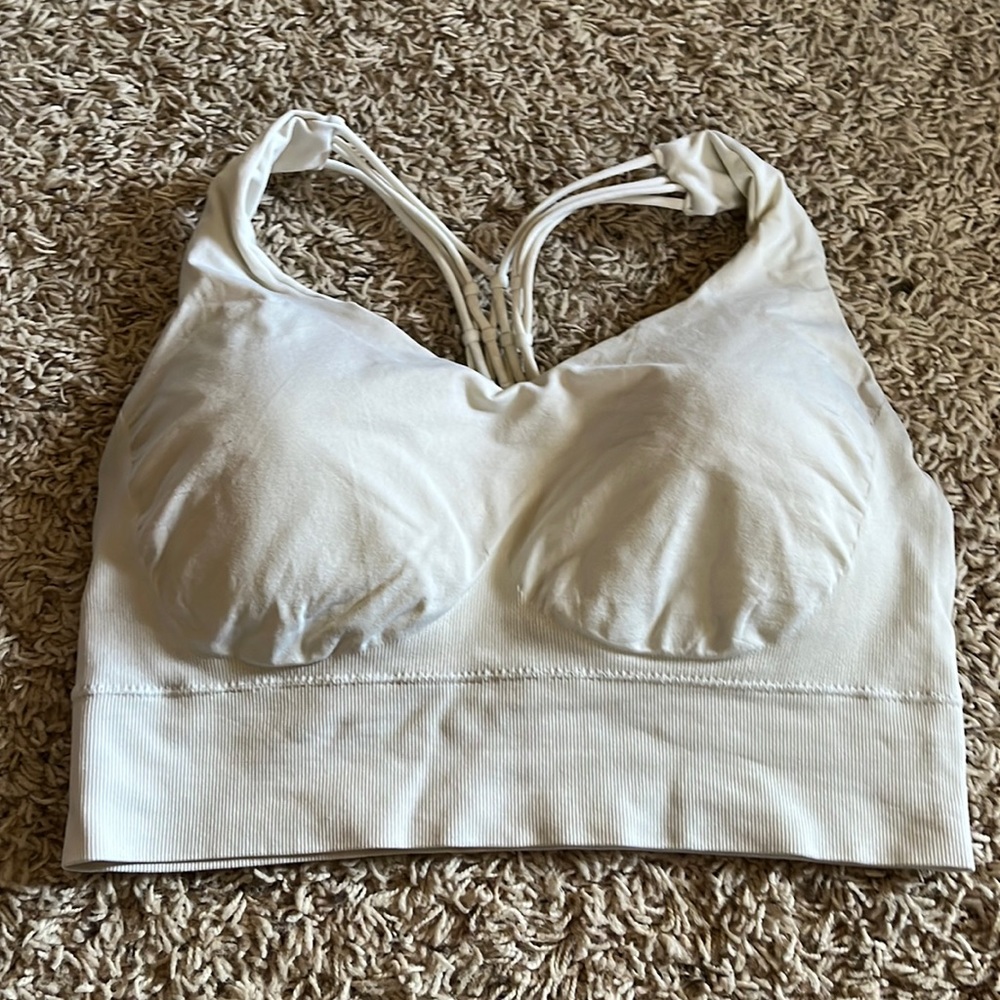 One black and one white size large sports bra